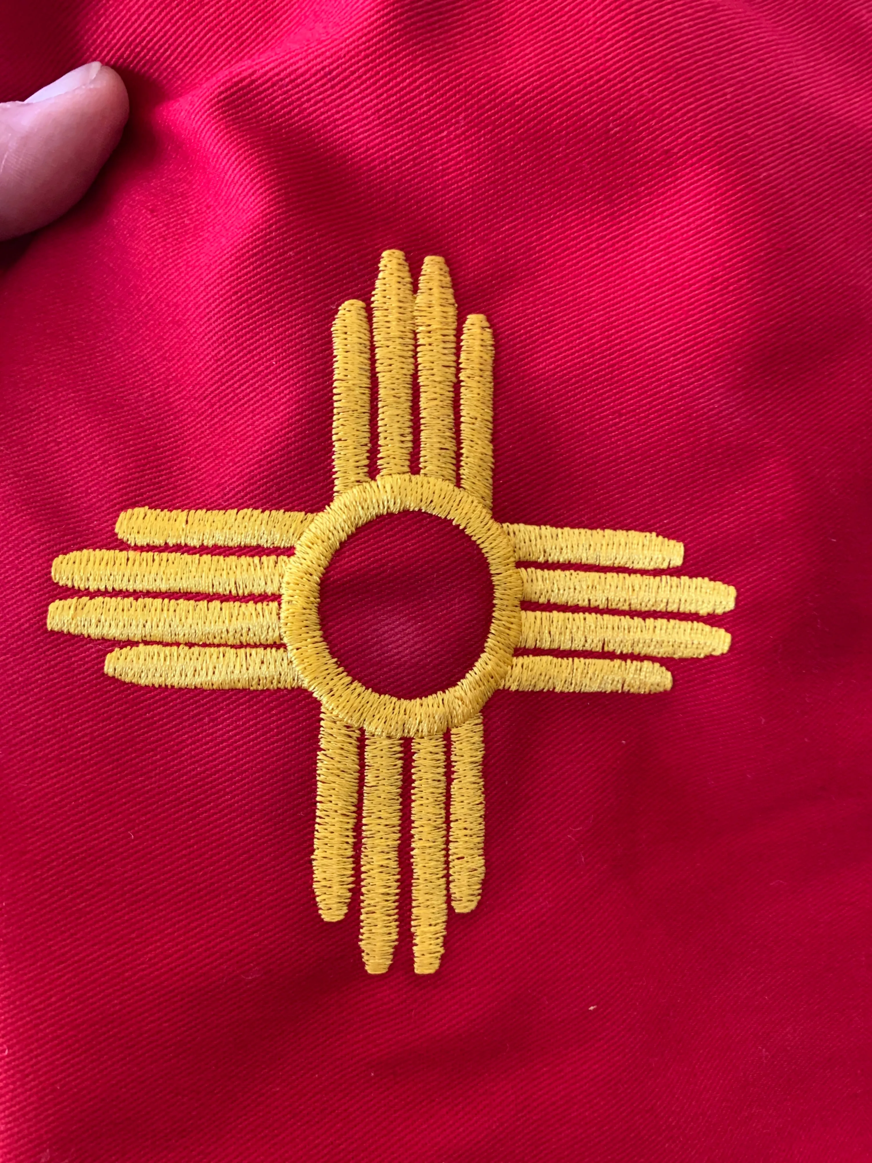 New Mexico True Aprons; Embroidered Zia Symbol